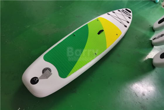 Kundengebundenes Grün und gelbe aufblasbare SCHLÜRFEN Brett stehen oben Paddleboard