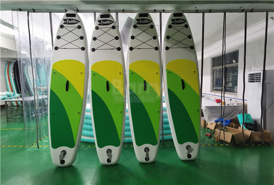 Kundengebundenes Grün und gelbe aufblasbare SCHLÜRFEN Brett stehen oben Paddleboard
