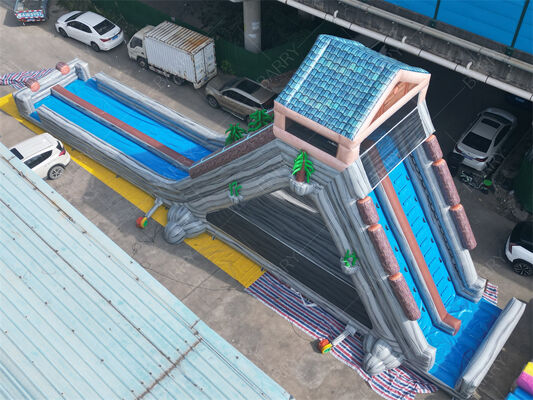 Gewaltige aufblasbare Wasserrutsche, Tropische Doppelspur, nasse/trockene Rutsche für Vergnügungsparks und Festivals