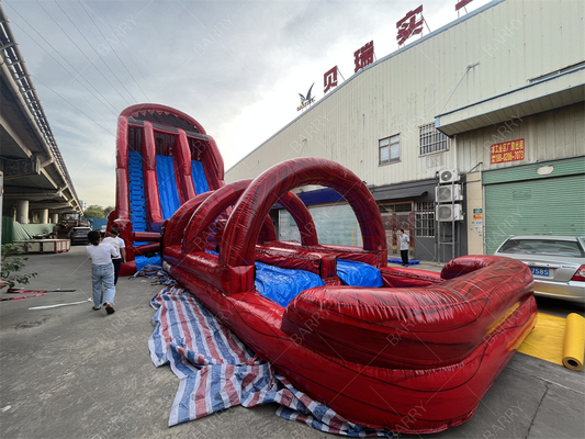 Fabrik maßgeschneiderte kommerzielle rote Riese Wasserrutsche Spannende aufblasbare Slip N Fly Zip Line Sport Spiel